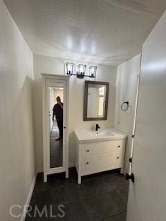 22425 Caminito Grande Unit 70, Laguna Hills, CA 92653 - bathroom featuring vanity and a chandelier