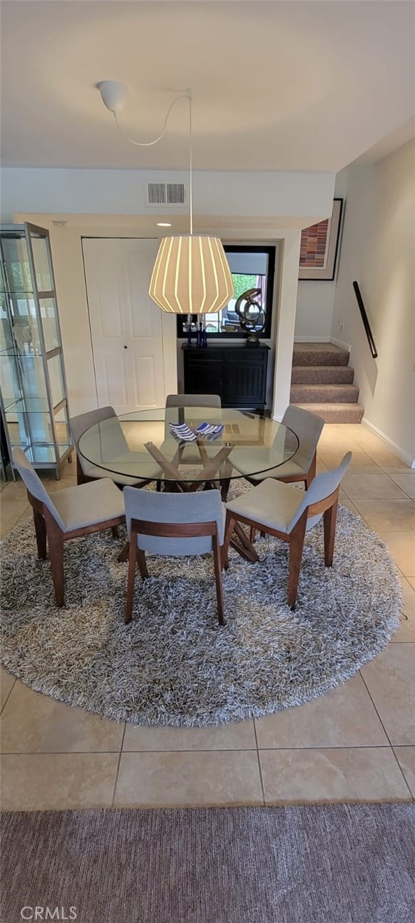 2600 S Palm Canyon Dr S Unit 21, Palm Springs, CA 92264 - living area featuring tile patterned floors and stairway