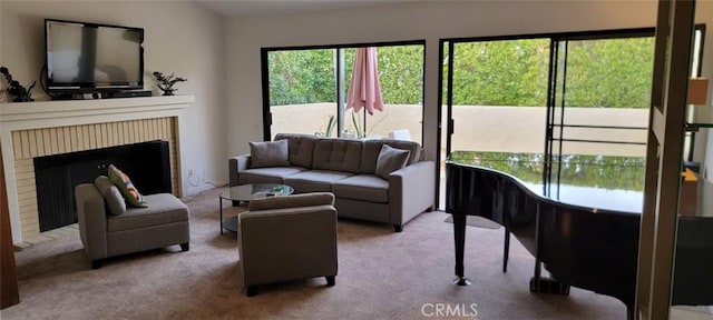 2600 S Palm Canyon Dr S Unit 21, Palm Springs, CA 92264 - carpeted living room featuring a brick fireplace