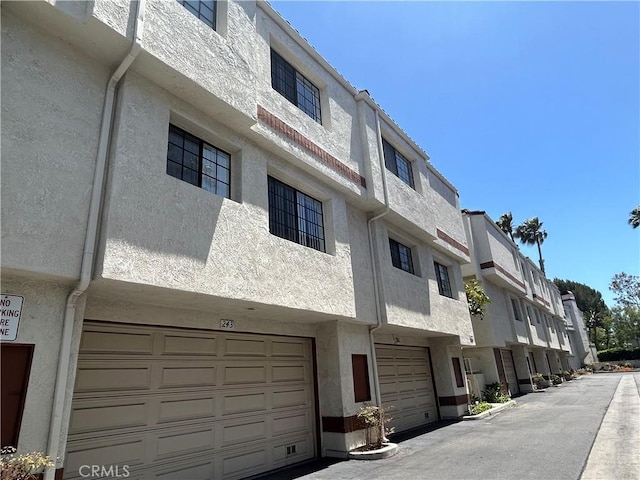 2971 Plaza Del Amo Unit 243, Torrance, CA 90503 - view of building exterior with a residential view and an attached garage