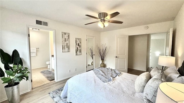 2971 Plaza Del Amo Unit 243, Torrance, CA 90503 - bedroom featuring wood finished floors, ensuite bath, and ceiling fan