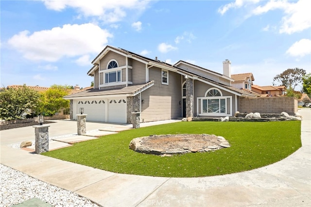 2251 Via Pacifica, Corona, CA 92882 - traditional-style house featuring an attached garage and concrete driveway