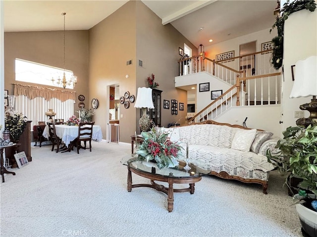 30027 Via Amante, Menifee, CA 92584 - carpeted living area with high vaulted ceiling, a chandelier, stairs, baseboards, and beam ceiling
