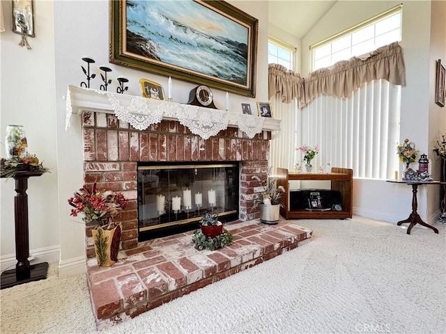 30027 Via Amante, Menifee, CA 92584 - living area featuring a fireplace, baseboards, carpet flooring, and vaulted ceiling