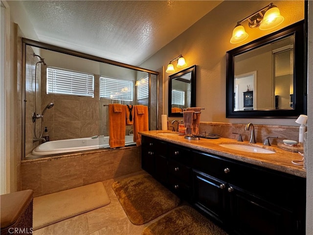 30027 Via Amante, Menifee, CA 92584 - bathroom with tiled shower / bath, a textured ceiling, double vanity, and tile patterned floors