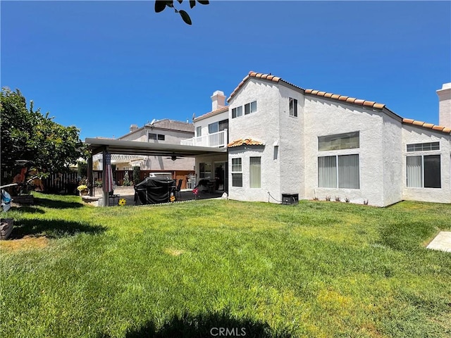 30027 Via Amante, Menifee, CA 92584 - rear view of house featuring a patio area, a chimney, a balcony, stucco siding, and a tile roof