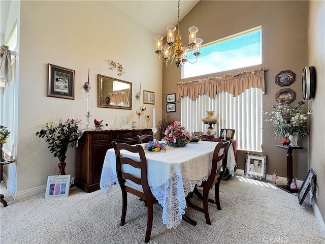 30027 Via Amante, Menifee, CA 92584 - carpeted dining room featuring high vaulted ceiling, a chandelier, and baseboards