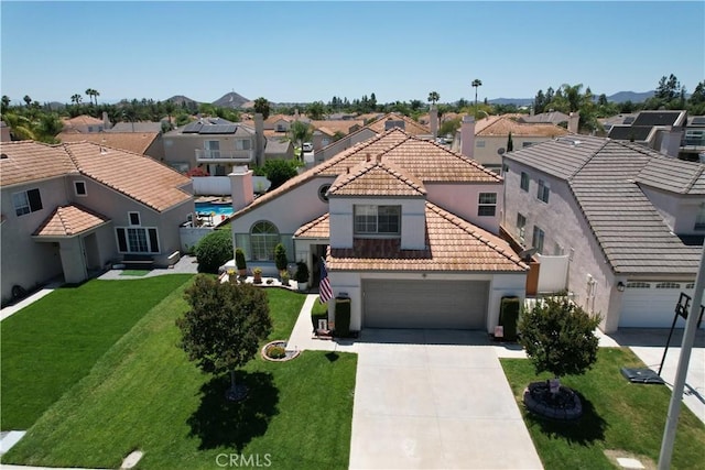 30027 Via Amante, Menifee, CA 92584 - mediterranean / spanish house with a residential view, stucco siding, a tiled roof, and driveway