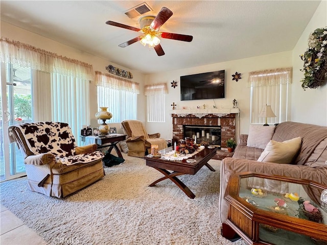 30027 Via Amante, Menifee, CA 92584 - living area with healthy amount of natural light, a fireplace, and ceiling fan