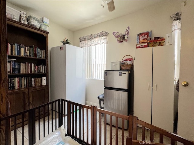 30027 Via Amante, Menifee, CA 92584 - bedroom featuring freestanding refrigerator and a crib