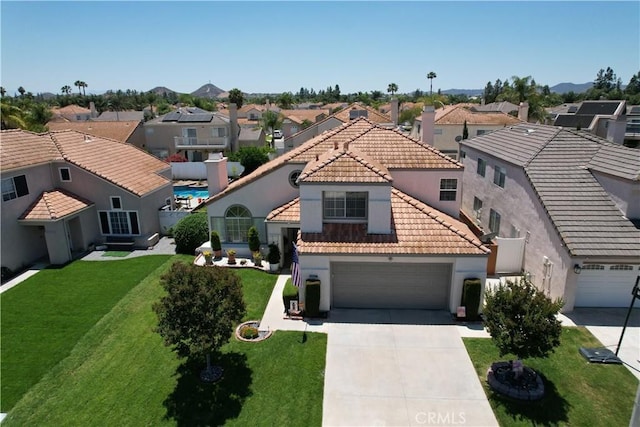 30027 Via Amante, Menifee, CA 92584 - mediterranean / spanish house with a residential view, a tile roof, stucco siding, and driveway