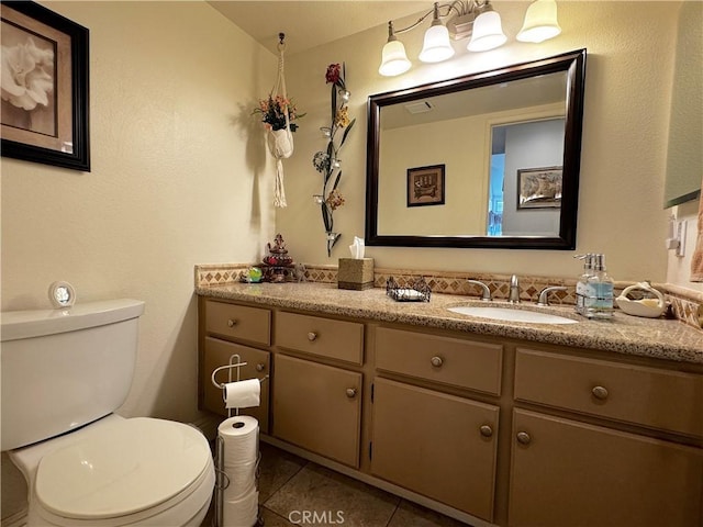 30027 Via Amante, Menifee, CA 92584 - half bath featuring vanity, toilet, and tile patterned flooring