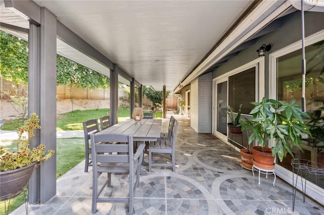 5226 Old Mill Rd, Riverside, CA 92504 - fenced backyard featuring a patio and outdoor dining area