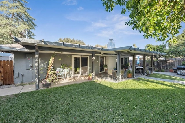 5226 Old Mill Rd, Riverside, CA 92504 - rear view of property featuring a patio, ceiling fan, and stucco siding