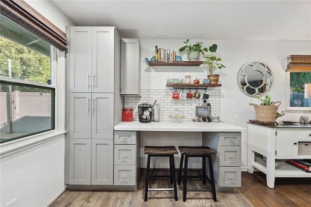 5226 Old Mill Rd, Riverside, CA 92504 - kitchen with gray cabinets, open shelves, tasteful backsplash, and light countertops