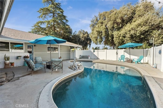 5226 Old Mill Rd, Riverside, CA 92504 - view of swimming pool with a patio area and a fenced backyard