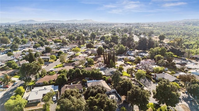 5226 Old Mill Rd, Riverside, CA 92504 - aerial view of property and surrounding area with nearby suburban area and a mountain backdrop