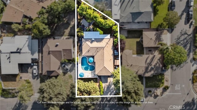 5226 Old Mill Rd, Riverside, CA 92504 - aerial view of residential area featuring a pool area and property parcel outlined
