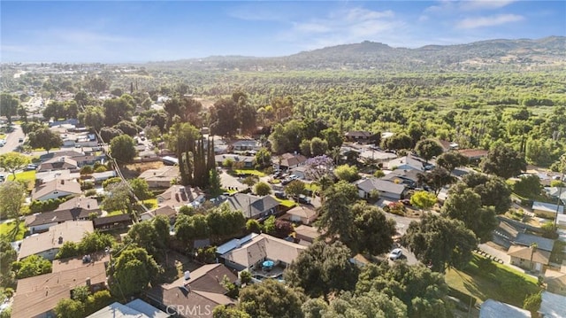5226 Old Mill Rd, Riverside, CA 92504 - aerial view of property's location with a mountainous background and nearby suburban area