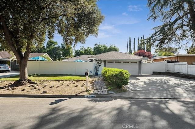 5226 Old Mill Rd, Riverside, CA 92504 - single story home with a garage and driveway
