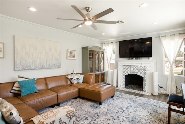 15952 Norcrest Dr, Whittier, CA 90604 - living room with crown molding, wood finished floors, a ceiling fan, recessed lighting, and a fireplace