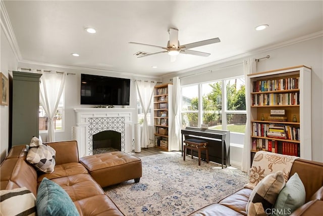 15952 Norcrest Dr, Whittier, CA 90604 - living room with a ceiling fan, ornamental molding, recessed lighting, a fireplace, and wood finished floors