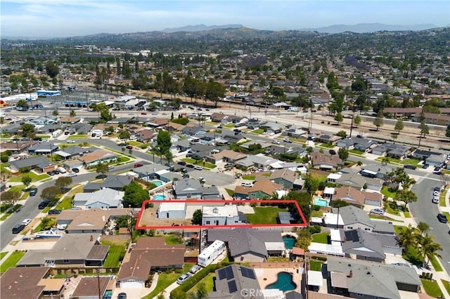 15952 Norcrest Dr, Whittier, CA 90604 - aerial overview of property's location featuring a mountainous background and property boundaries highlighted