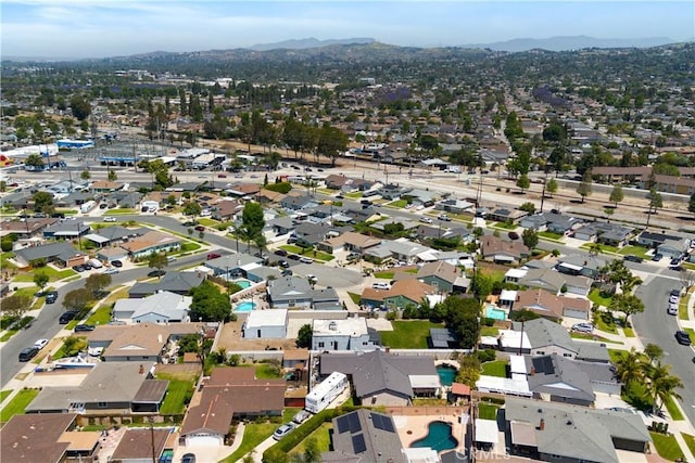 15952 Norcrest Dr, Whittier, CA 90604 - aerial view of property and surrounding area with mountains and nearby suburban area