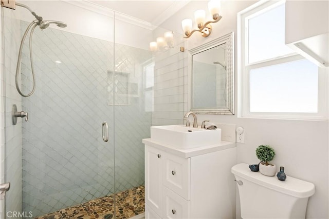 15952 Norcrest Dr, Whittier, CA 90604 - full bathroom featuring healthy amount of natural light, ornamental molding, toilet, vanity, and a stall shower
