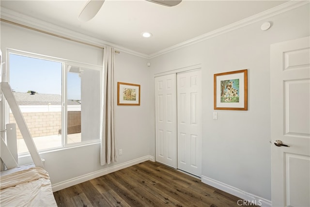 15952 Norcrest Dr, Whittier, CA 90604 - unfurnished bedroom with dark wood-style flooring, crown molding, baseboards, a closet, and a ceiling fan
