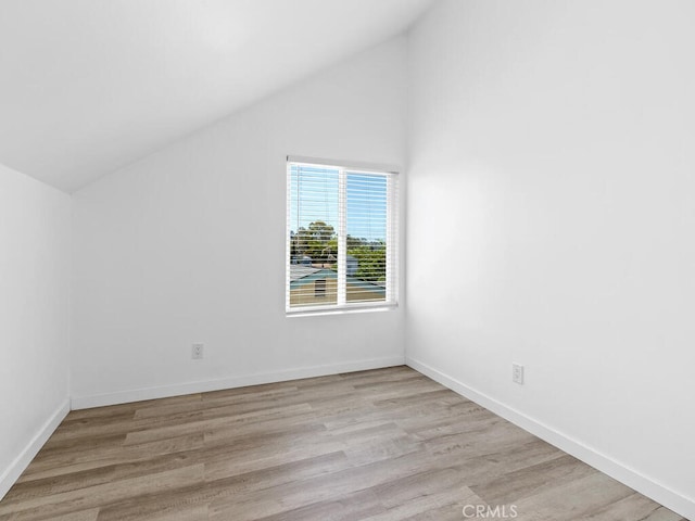 1914 Radford St, Oceanside, CA 92056 - bonus room with vaulted ceiling, light wood-type flooring, and baseboards