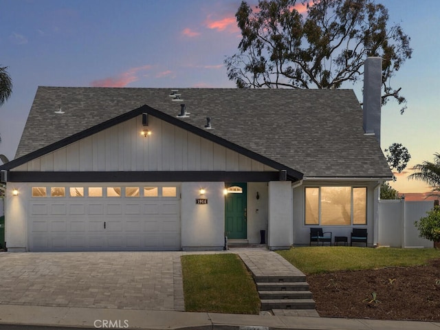 1914 Radford St, Oceanside, CA 92056 - view of front facade featuring roof with shingles, a garage, and driveway