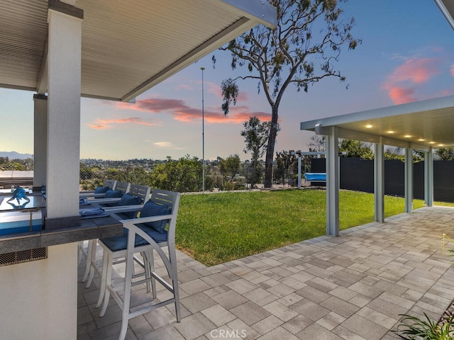 1914 Radford St, Oceanside, CA 92056 - patio terrace at dusk featuring a patio area and a yard
