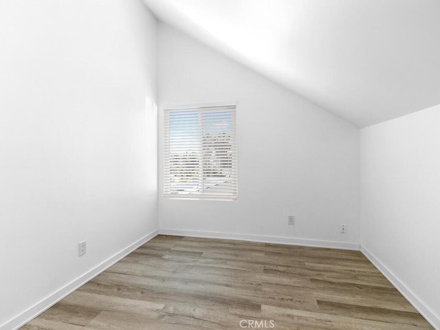 1914 Radford St, Oceanside, CA 92056 - additional living space featuring vaulted ceiling, wood finished floors, and baseboards