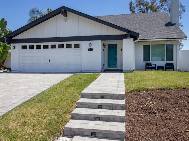 1914 Radford St, Oceanside, CA 92056 - ranch-style home featuring a shingled roof, a garage, a front yard, and driveway