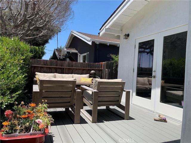 11565 Iowa Ave, Los Angeles, CA 90025 - deck featuring french doors, outdoor lounge area, and outdoor dining space
