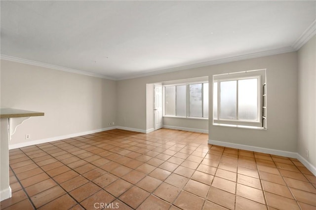 1187 E 3rd St Unit 104, Long Beach, CA 90802 - unfurnished room featuring ornamental molding, light tile patterned flooring, and baseboards