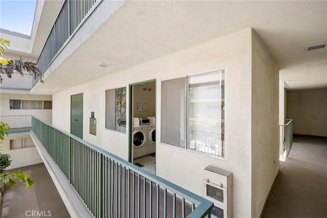 1187 E 3rd St Unit 104, Long Beach, CA 90802 - balcony with washing machine and clothes dryer