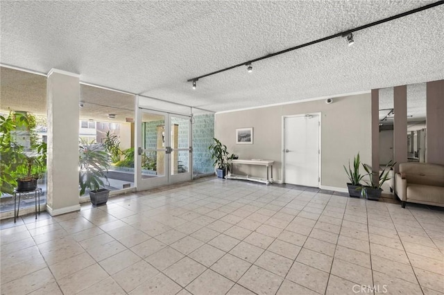 1187 E 3rd St Unit 104, Long Beach, CA 90802 - building lobby with a textured ceiling and crown molding