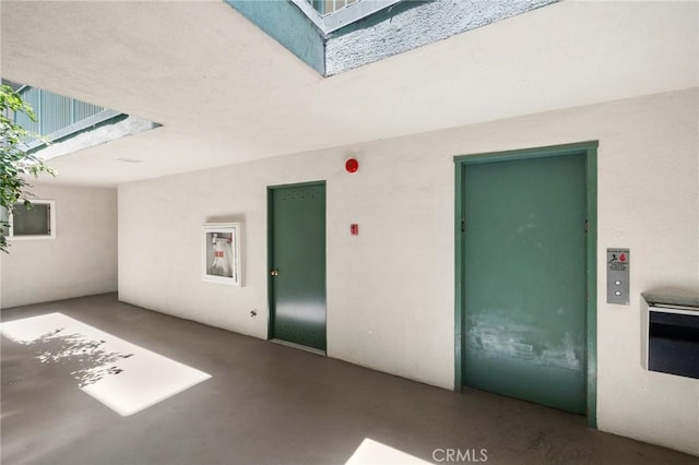 1187 E 3rd St Unit 104, Long Beach, CA 90802 - doorway to property featuring elevator and a patio