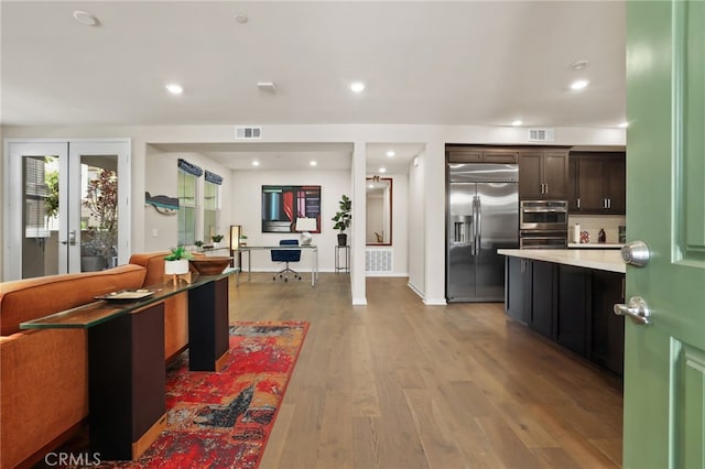 223 Carlow, Irvine, CA 92618 - living area with light wood-type flooring and recessed lighting
