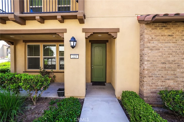 223 Carlow, Irvine, CA 92618 - view of exterior entry featuring stucco siding