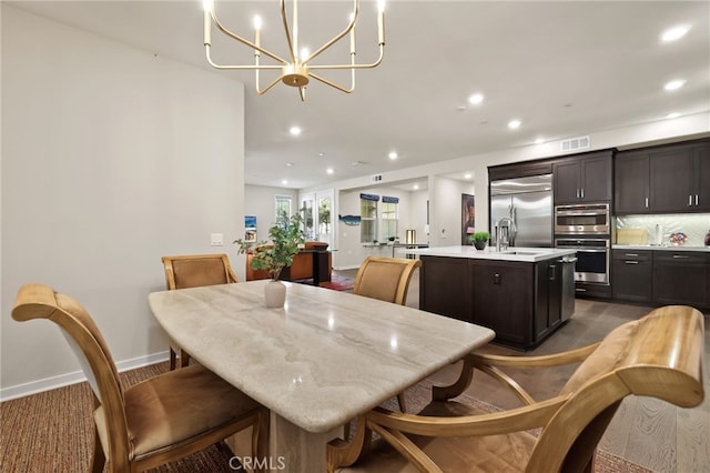 223 Carlow, Irvine, CA 92618 - dining room featuring recessed lighting, baseboards, and a chandelier