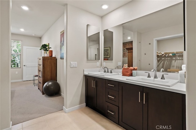 223 Carlow, Irvine, CA 92618 - full bath featuring double vanity, baseboards, recessed lighting, a spacious closet, and tile patterned floors