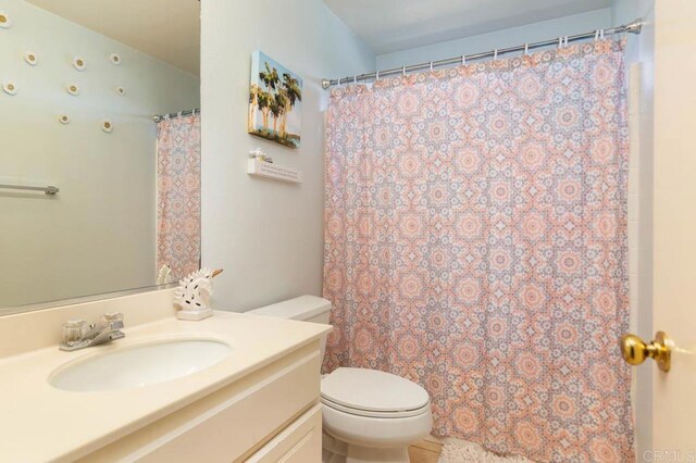 1306 Mill Valley Rd, Chula Vista, CA 91913 - bathroom with toilet, vanity, and a shower with curtain