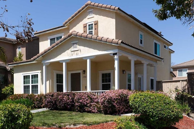 1306 Mill Valley Rd, Chula Vista, CA 91913 - mediterranean / spanish home with a tiled roof, a porch, and stucco siding