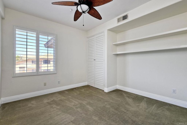 3313 Dehesa Rd Unit 85, El Cajon, CA 92019 - unfurnished bedroom with dark colored carpet and ceiling fan