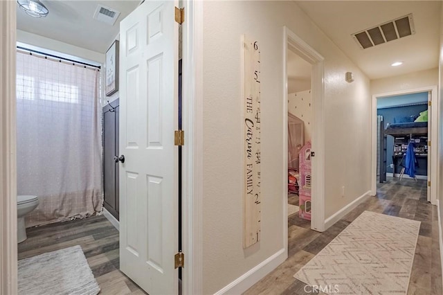 1266 Panorama Point Ct, Merced, CA 95340 - corridor with wood finished floors and baseboards
