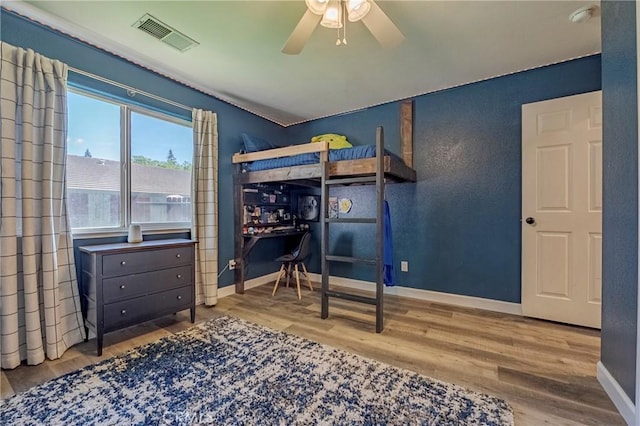 1266 Panorama Point Ct, Merced, CA 95340 - bedroom with wood finished floors, baseboards, and ceiling fan