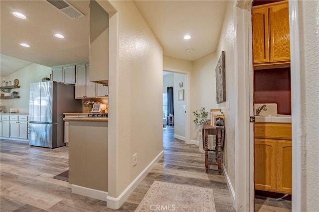 1266 Panorama Point Ct, Merced, CA 95340 - hallway featuring light wood-type flooring, recessed lighting, and baseboards